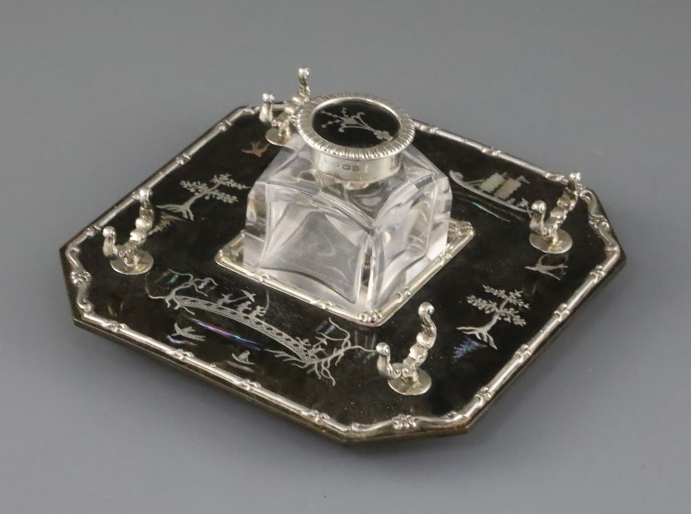 An Edwardian silver, mother of pearl and tortoiseshell chinoiserie inkstandish, retailed by Goldsmiths & Silversmiths Co Ltd,